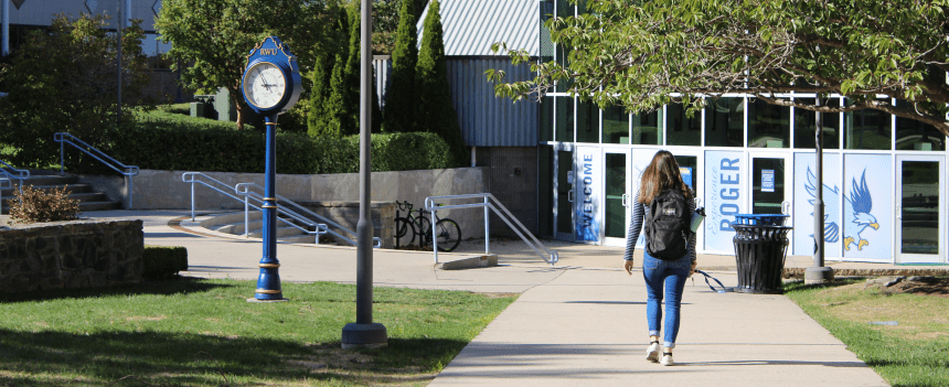 Girl walking on campus